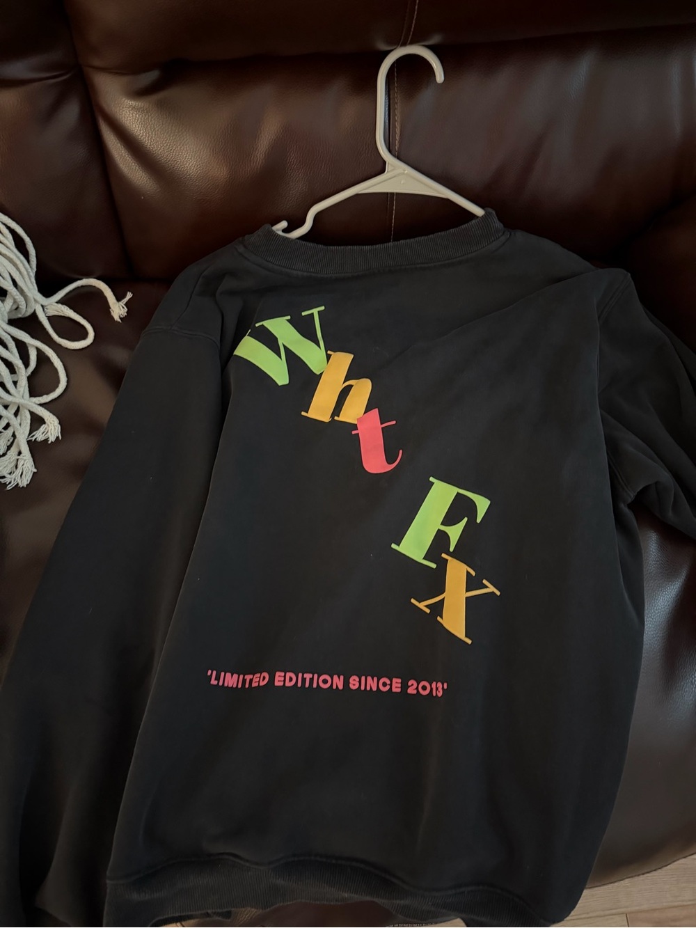 Black Graphic Sweatshirt with Colorful 'WHTFX' Print